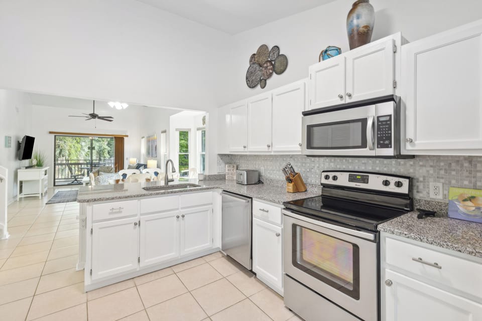 The open-concept living and dining area ensures that everyone in the group stays included in the conversation and admires the culinary adventures of the chef among you.