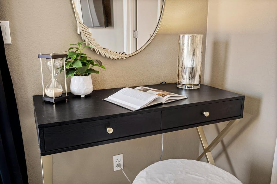 Step into sophistication with an elegant desk and chair, perfectly positioned for productivity and style