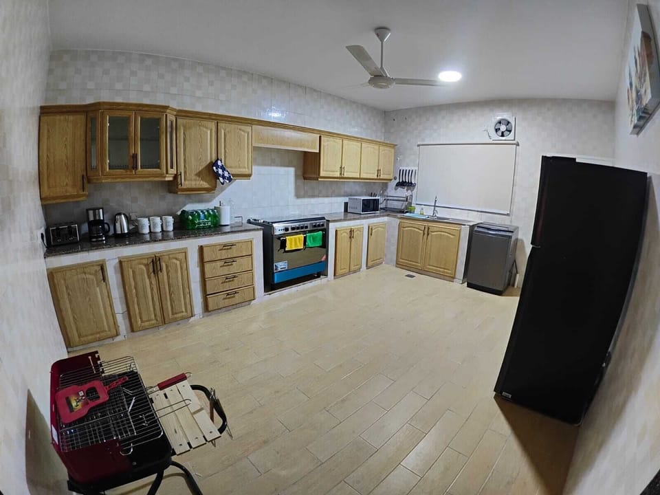 Fully Equipped Kitchen with all the necessary basic appliances and cutleries.