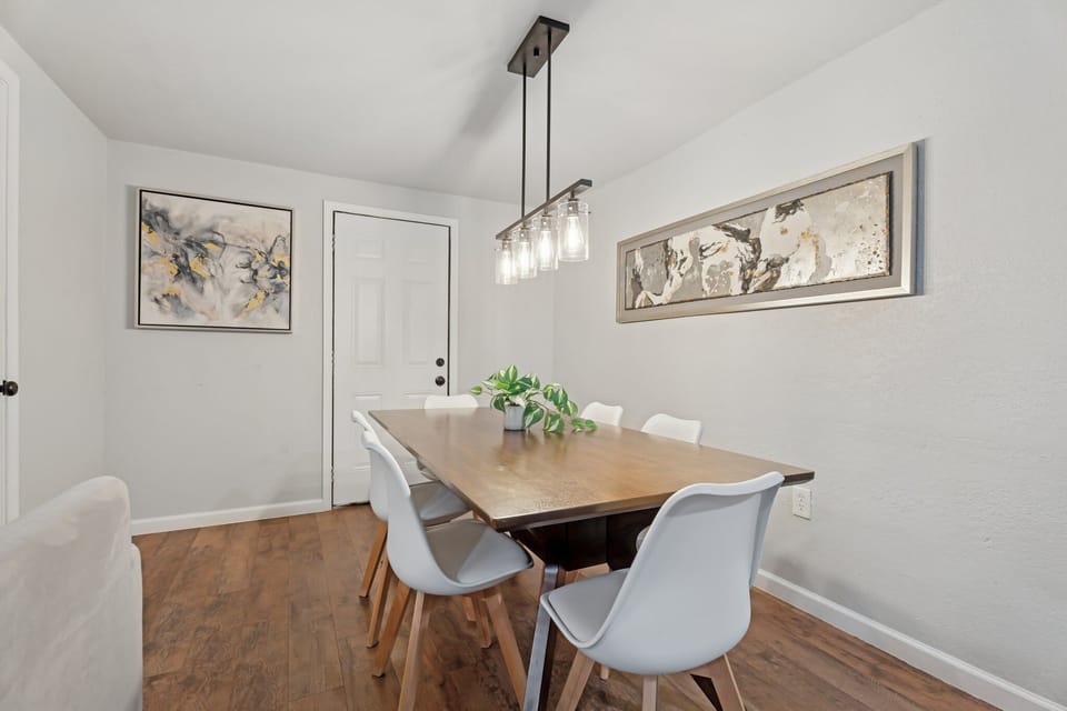 Spacious dining area that opens into a bonus bathroom—perfect for hosting with ease