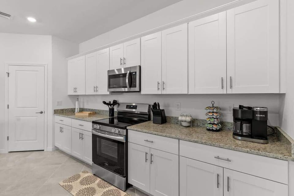 "Bright and Functional Kitchen with Plenty of Counter Space"