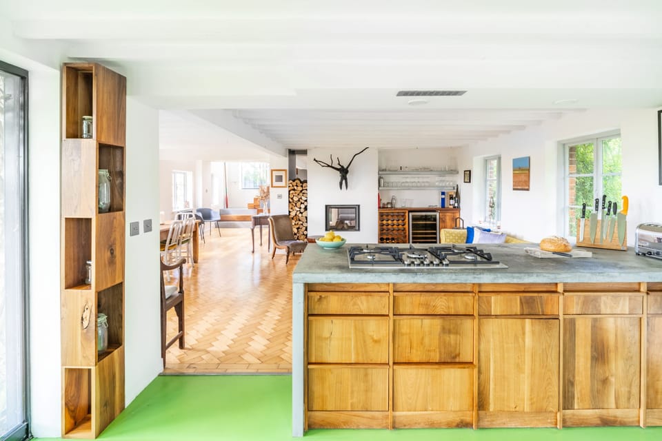 Ground floor: The kitchen overlooking the open-plan living space beyond