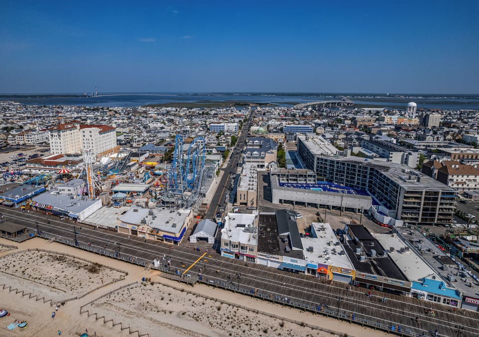 Aerial view of the property to the beach and boardwalk