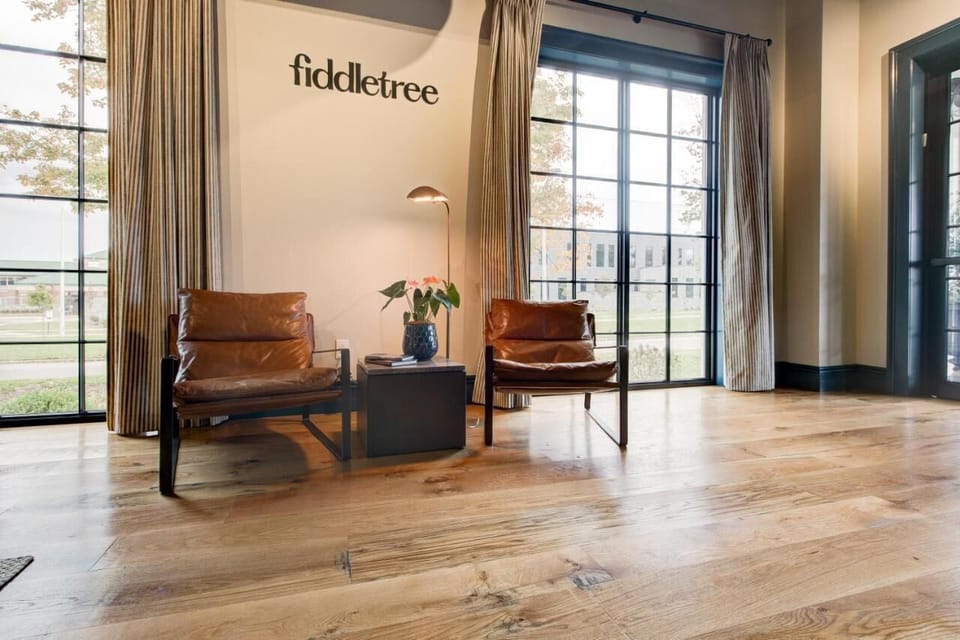Arrive and unwind by sunlit windows in a calm corner.
