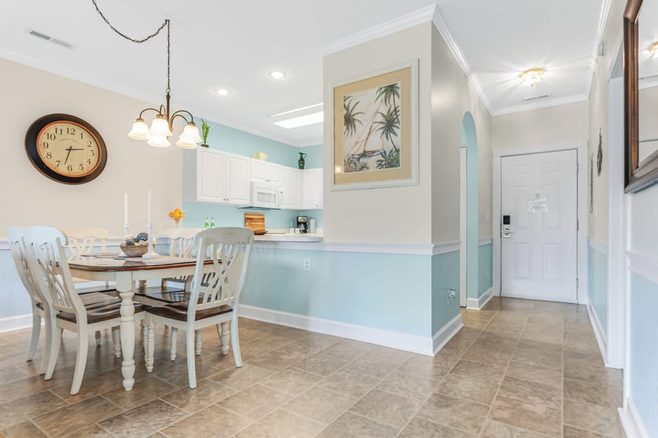 Enjoy a generously sized dining area complete with a dining set that seats six, perfect for hosting family meals or gathering with friends