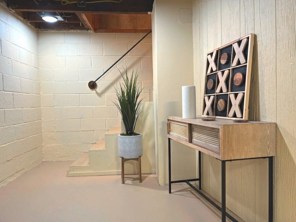 Steps leading to basement lounge area and bedrooms.
