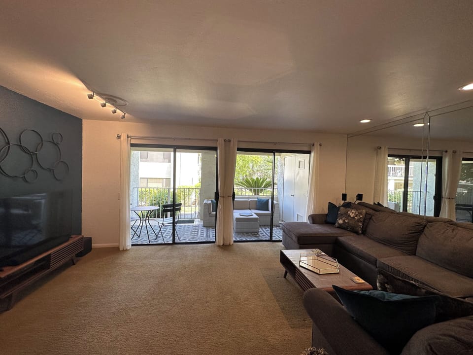 The large living room opens to the covered patio