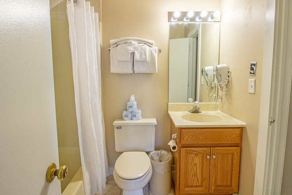 Shared full bathroom with shower