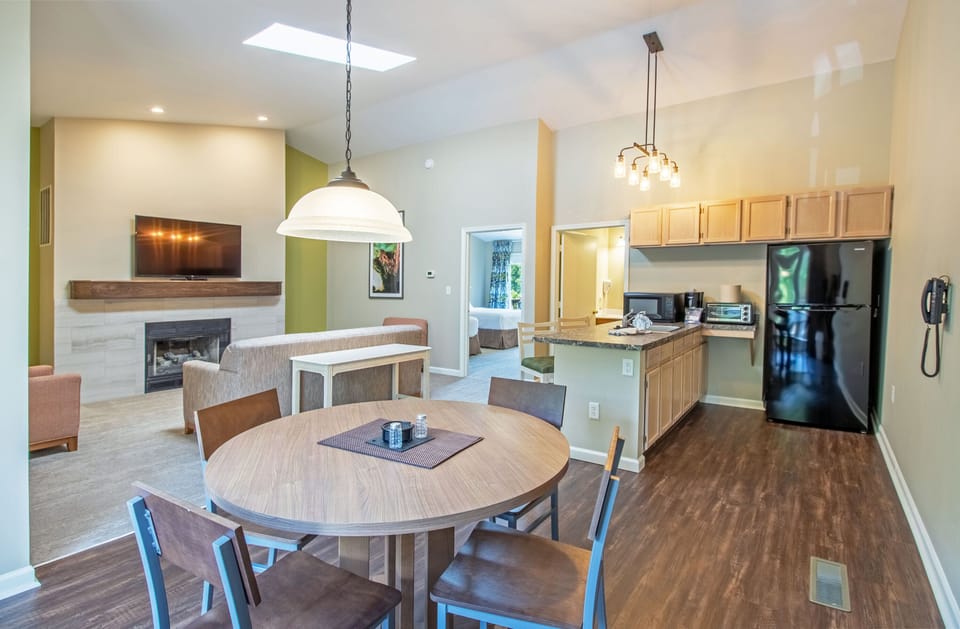 Dining area with seating for 4 and access to private deck
