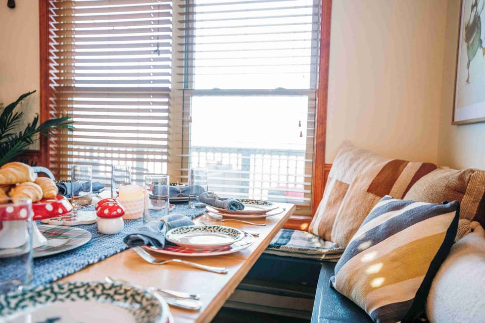 Cozy up in the banquette and enjoy Lake Harmony views-maybe our favorite spot!