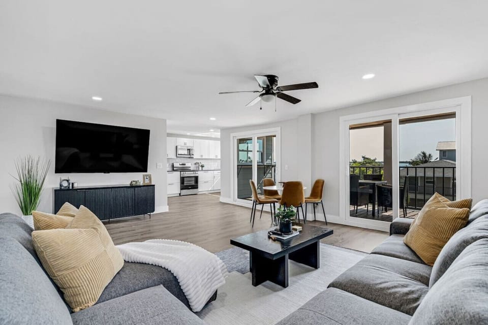 Comfortable living room with Smart TV and open layout.