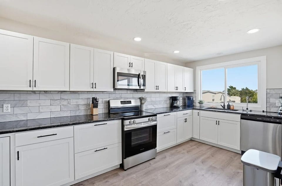 A bright, modern kitchen stocked with all the essentials.