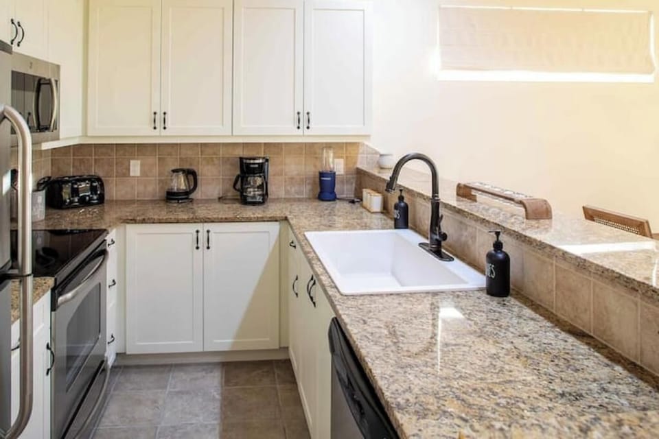 Fully stocked kitchen with small and large appliances
