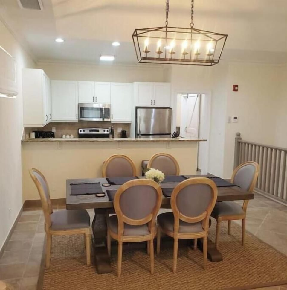 Open concept dining and kitchen on upper level