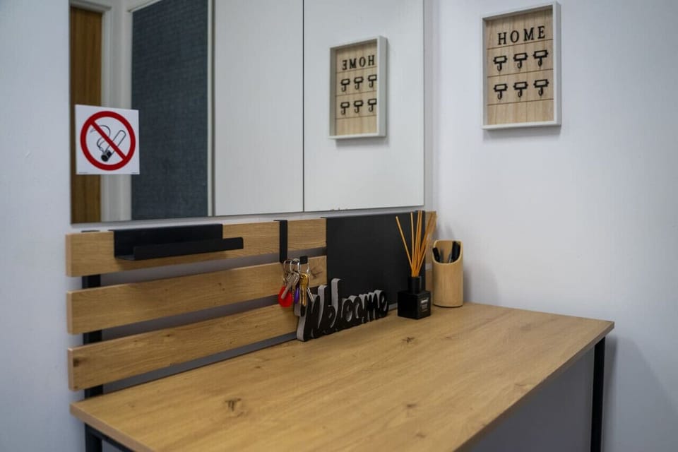 Comfortable Living Room with Sofa Bed and Smart TV | Book Now with RENTUJEMY