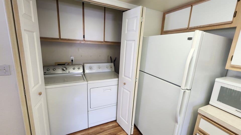 Washer And Dryer Right Off Of Kitchen