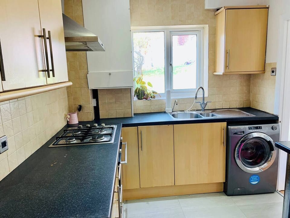  The kitchen consists of a washer and tumble drier, Slimline dishwasher, gas hob, oven, 2 tub stainless steel sink, breakfast bar and stools for 2 people, wine storage and cupboards, cooking utensils, coffee mugs, glasses and table wear for 4 people 