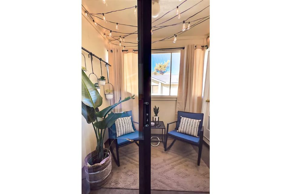 Enjoy morning coffee on the private balcony.