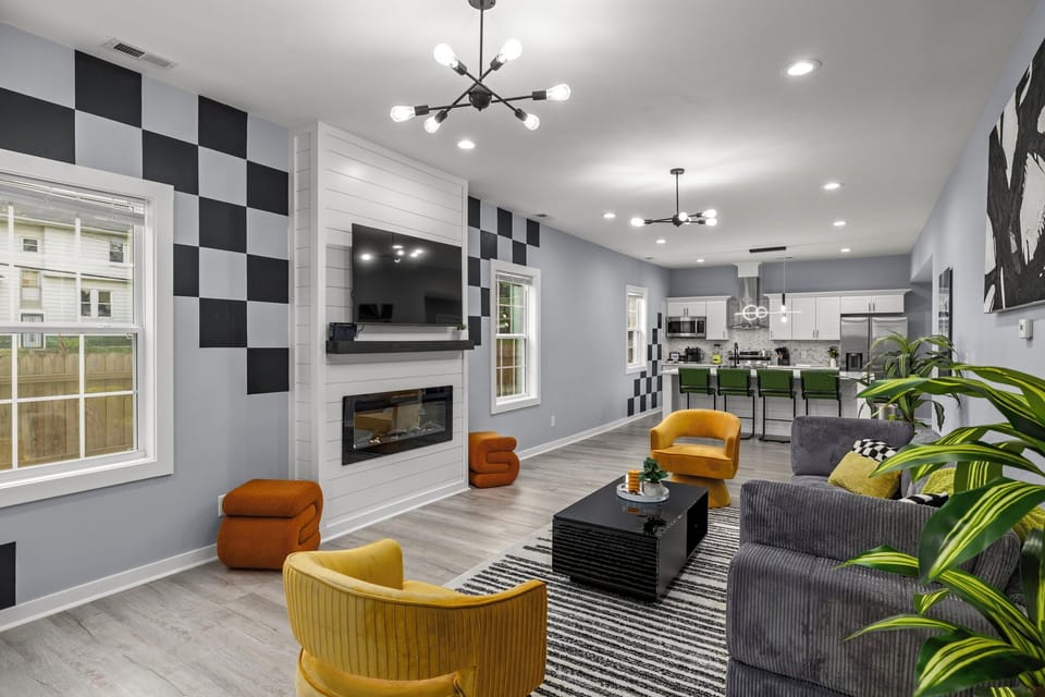 Living room with TV and indoor fireplace