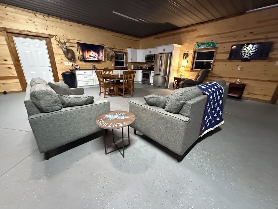 Kitchen and sitting area in garage.