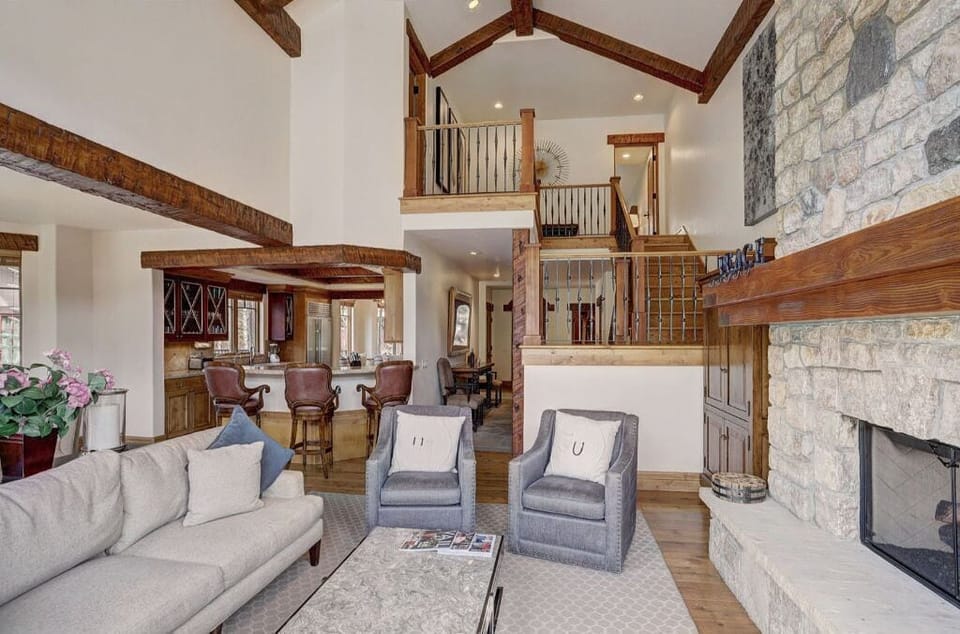 Spacious living area with stylish decor and abundant natural light.