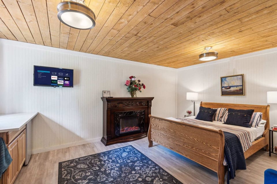 Our master bedroom has a queen-sized bed and a fireplace to keep you warm on chilly nights.