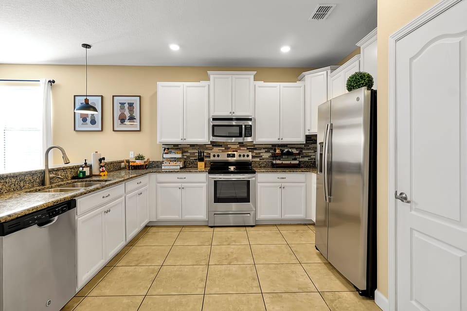 A fully equipped kitchen ready for family feasts and midnight snacks!