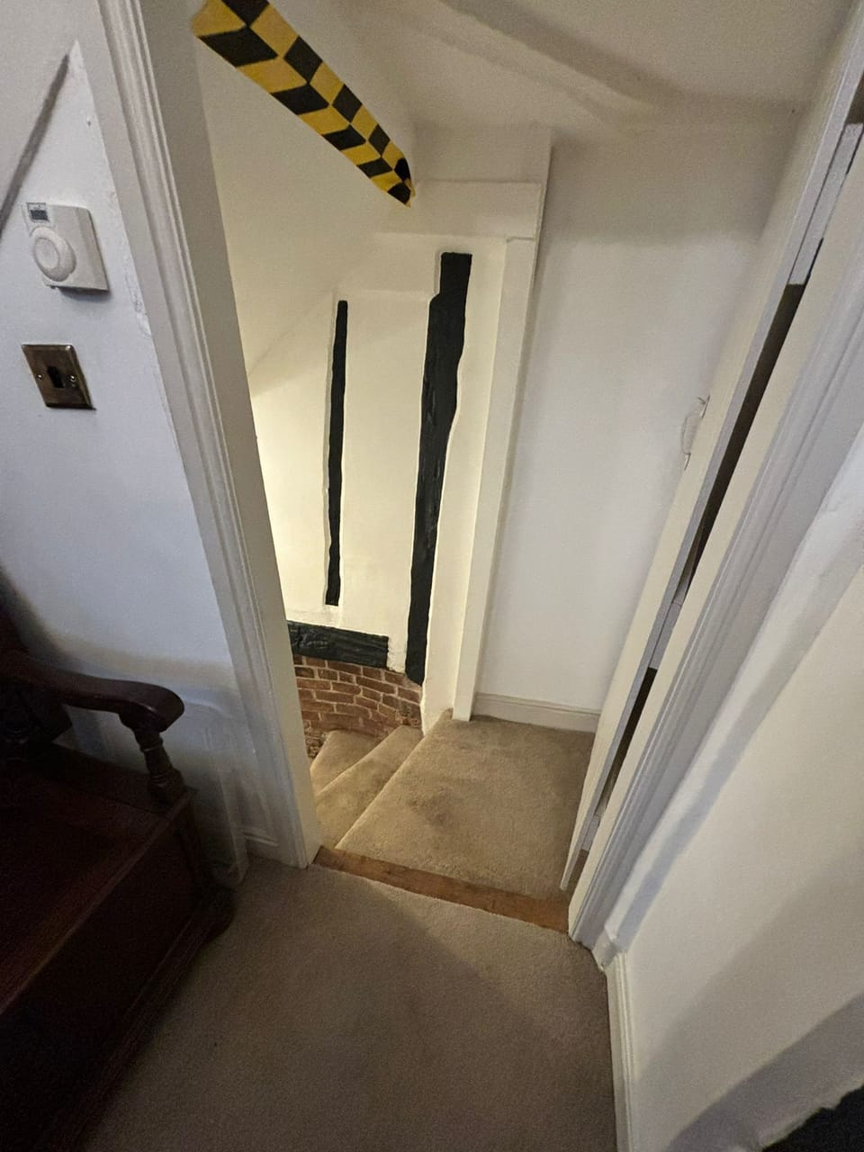 Stairs leading from Entrance Hall to Basement (Kitchen and Dining area)