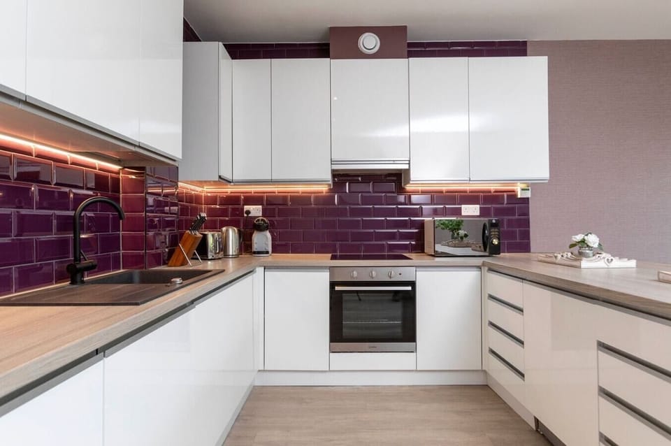 Integrated living and kitchen spaces in an open layout.
