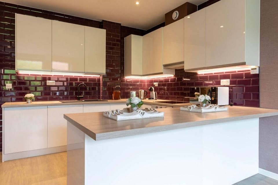 Integrated living and kitchen spaces in an open layout.