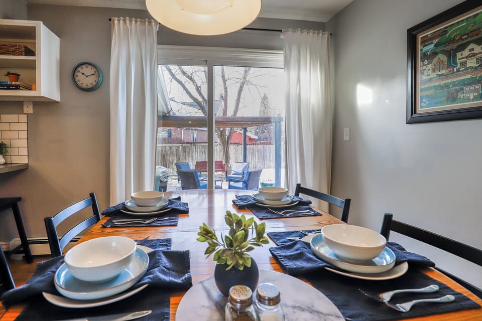 Dining area.  Round table has 3 leaves to accomodate up to 8 people.