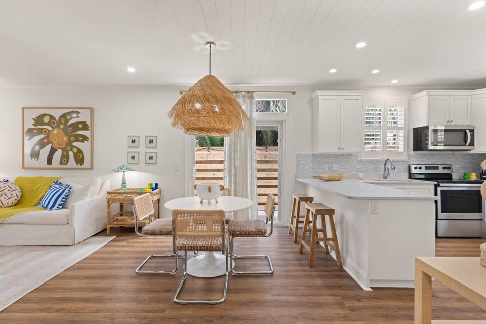 This condo is decorated to perfection with fun beachy lighting and wall decor.