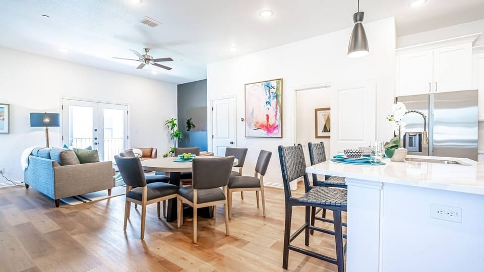 Kick back in a stylish, open-concept living space designed for comfort and connection. Whether you're debriefing after a Rangers game, watching pre-game coverage on the smart TV or just relaxing with your crew—The Ryan's living area has you covered.