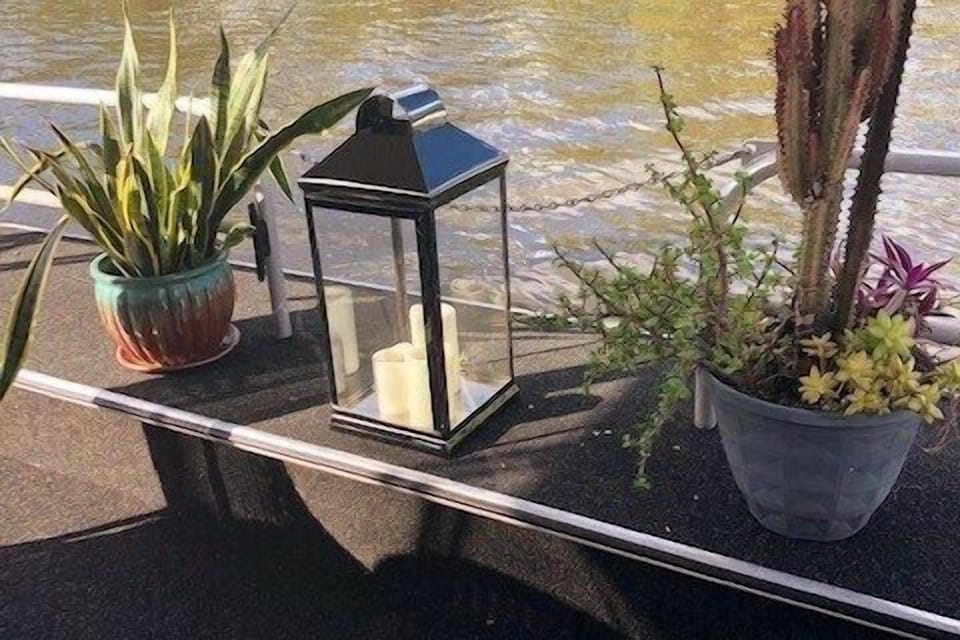 I'll leave a few plants on the bow & stern in hopes kind guests might water them occasionally.  If not, oh well, I've killed a few in my day.  I don't allow candles for obvious reasons, but these are the battery types and add ambiance in the evening