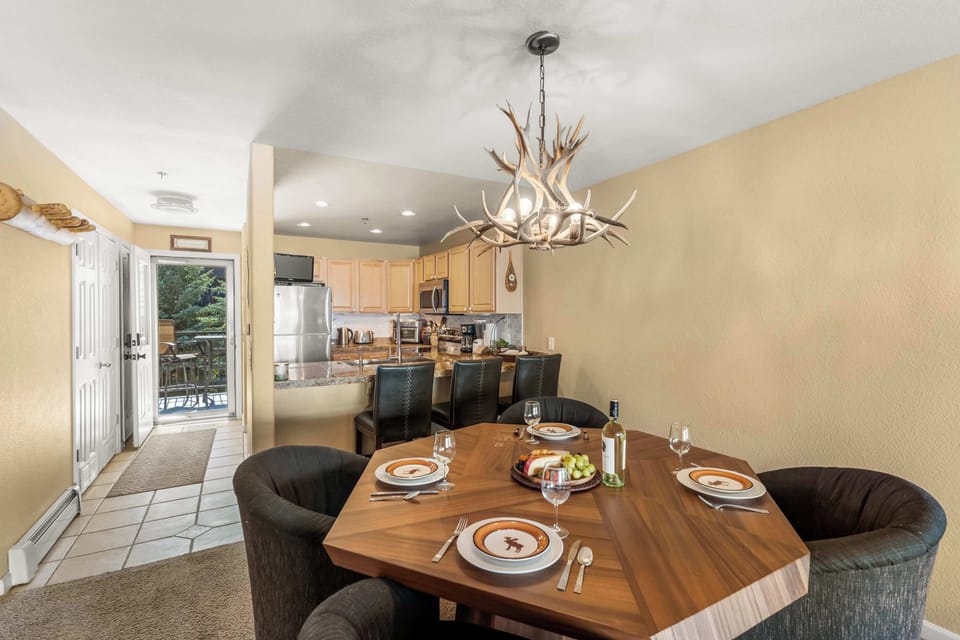 【Dining】Table for four — mountain light from the balcony door to your right