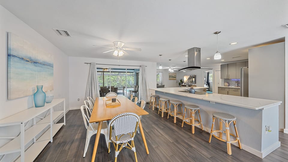 Plenty of seating in the kitchen and dining room areas.