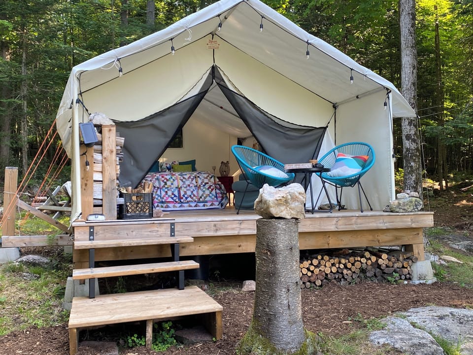 12 x 14 foot prospector tent with 6 foot front porch and solar lights