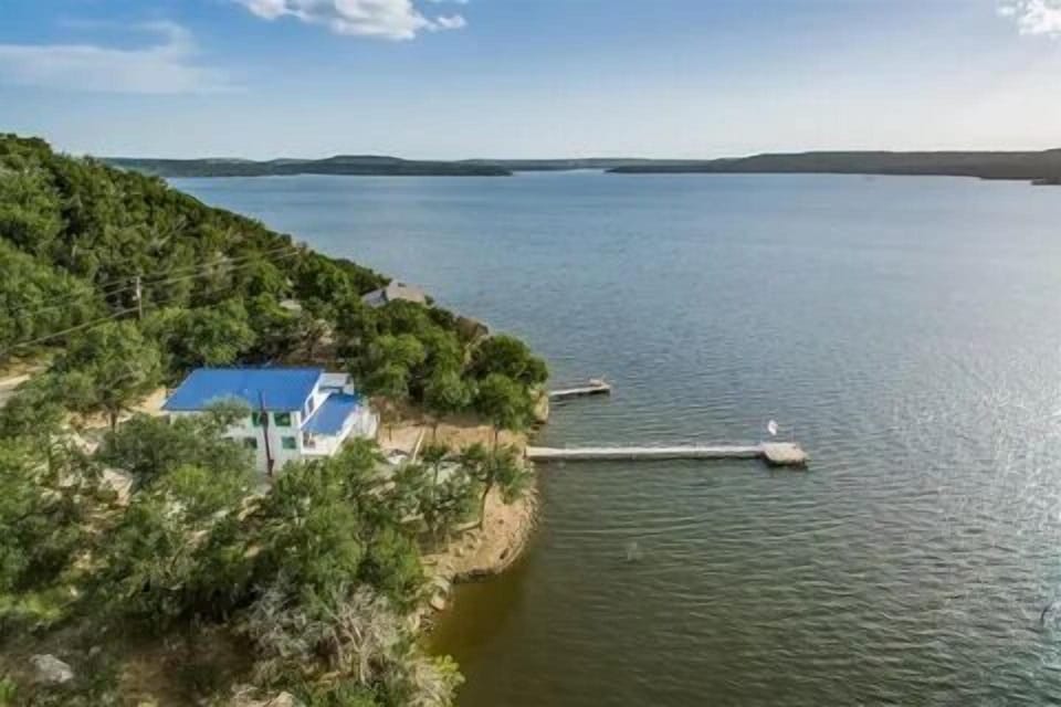 View of house and swim dock