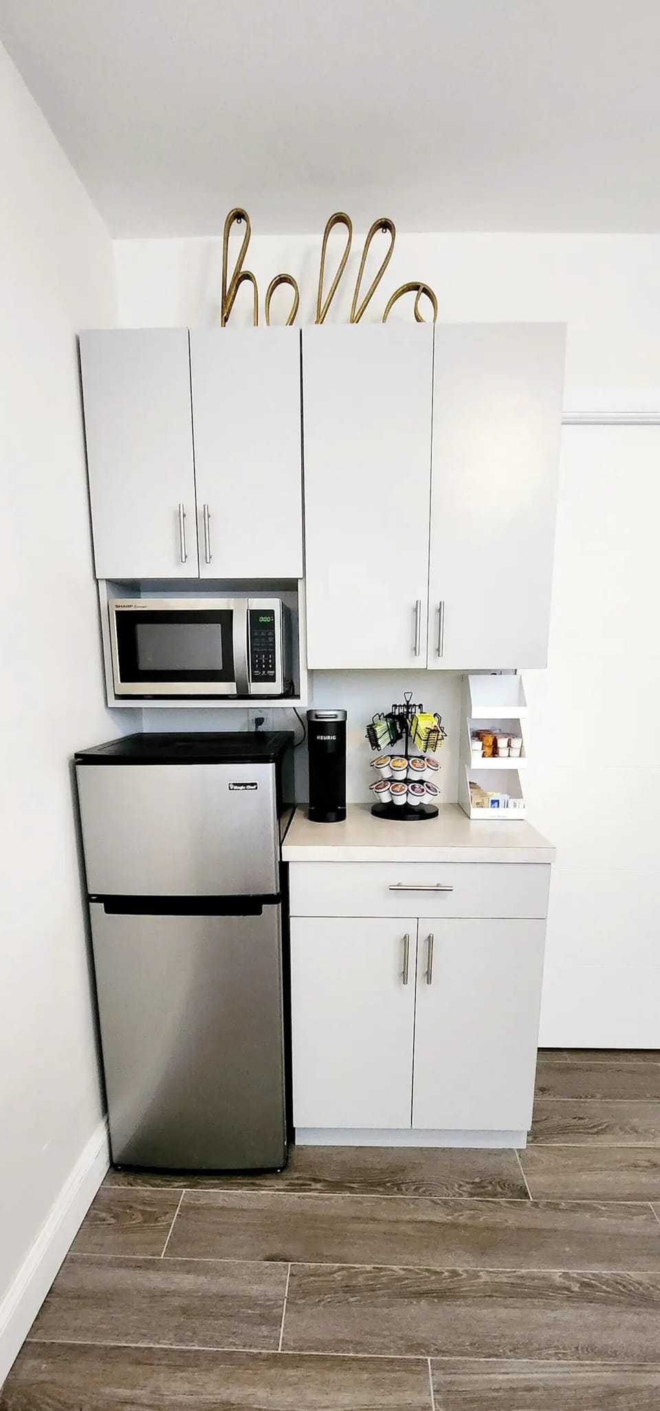 Enjoy fridge, coffee maker, tea kettle, toaster oven, and kitchen essentials. 