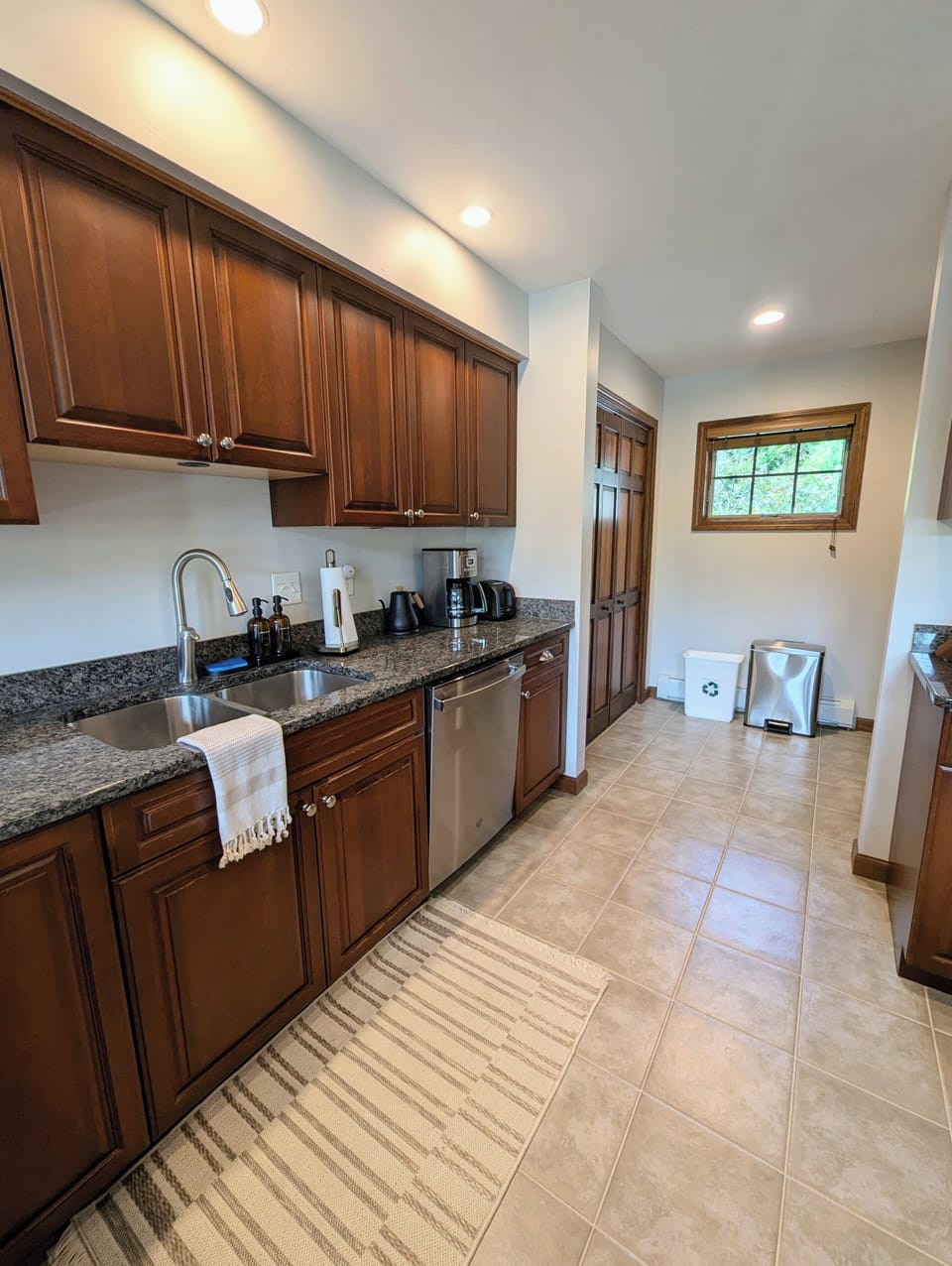 Coffee maker, electric kettle, filters, coffee, tea, sugar and creamer provided.