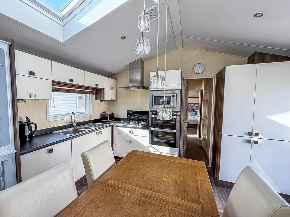 Enjoy the convenience of a comfortable kitchen area in a caravan during your staycation at Broadlands Sands Holiday Park, located near the exciting Pleasurewood Hills Lowestoft.