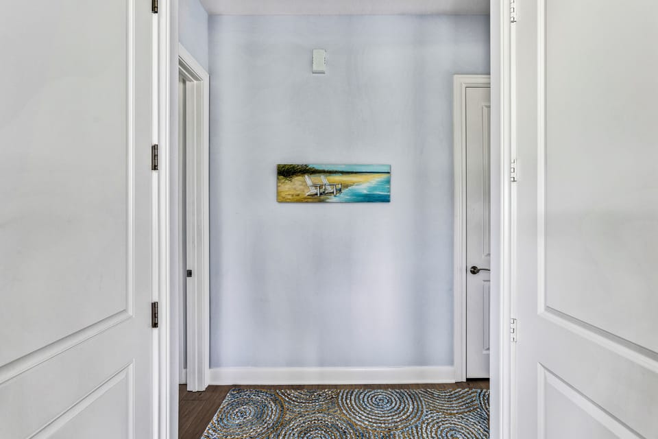 Bright walls and beachy art welcome you to your seaside adventure!