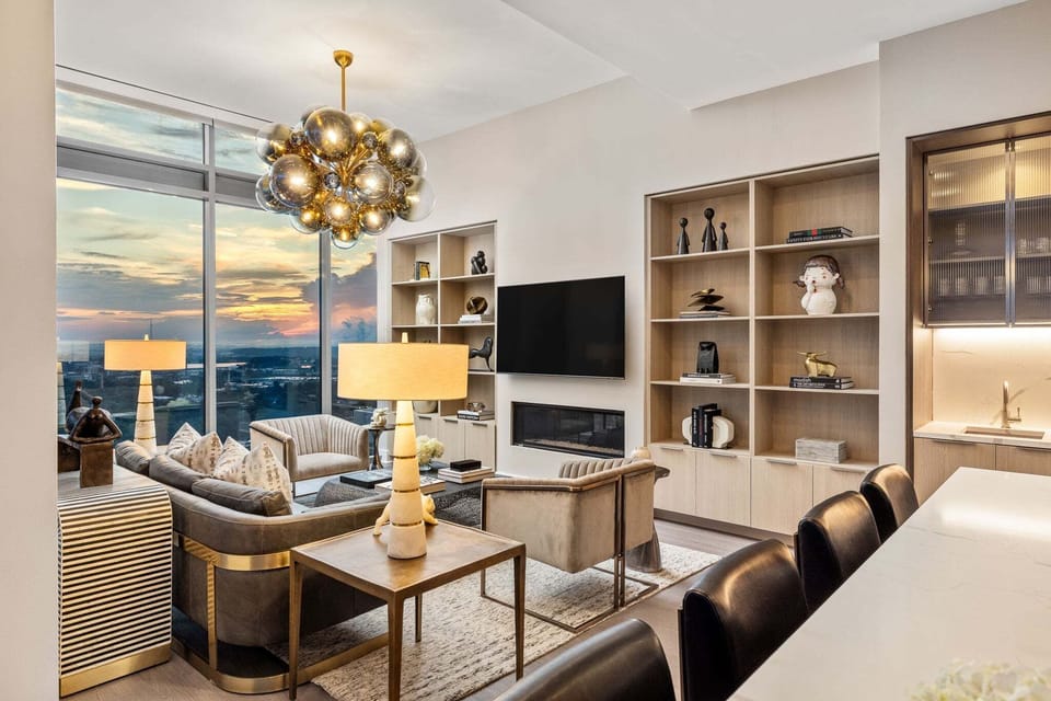 Living room featuring a 65" 4K UHD TV