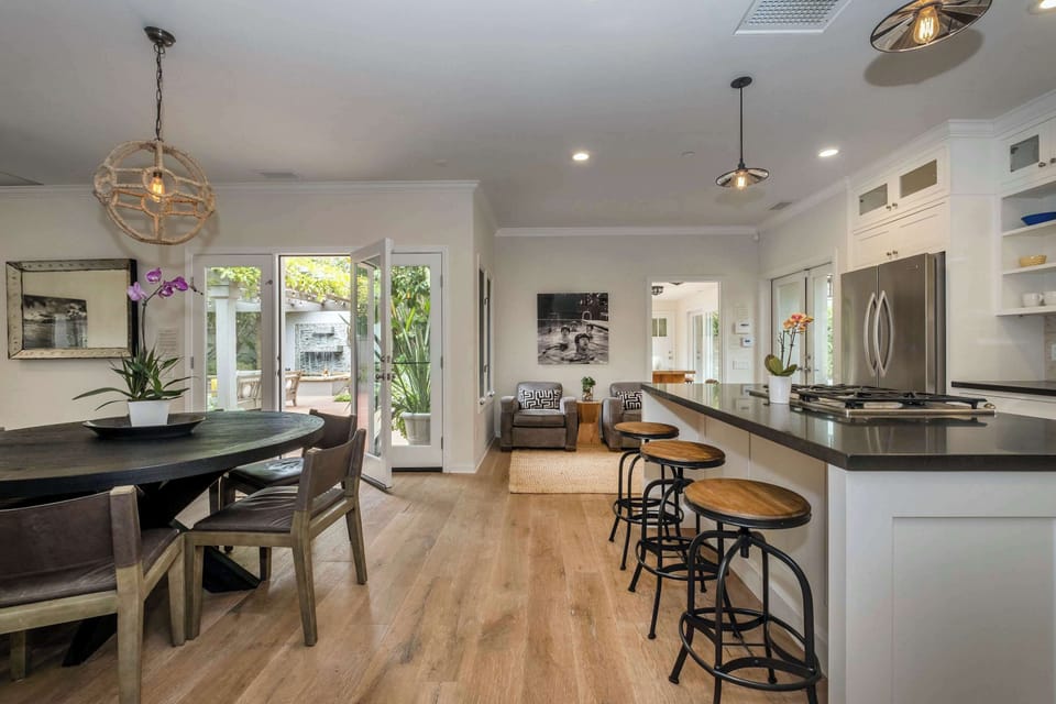 Main house kitchen with drip coffee maker, blender, and more