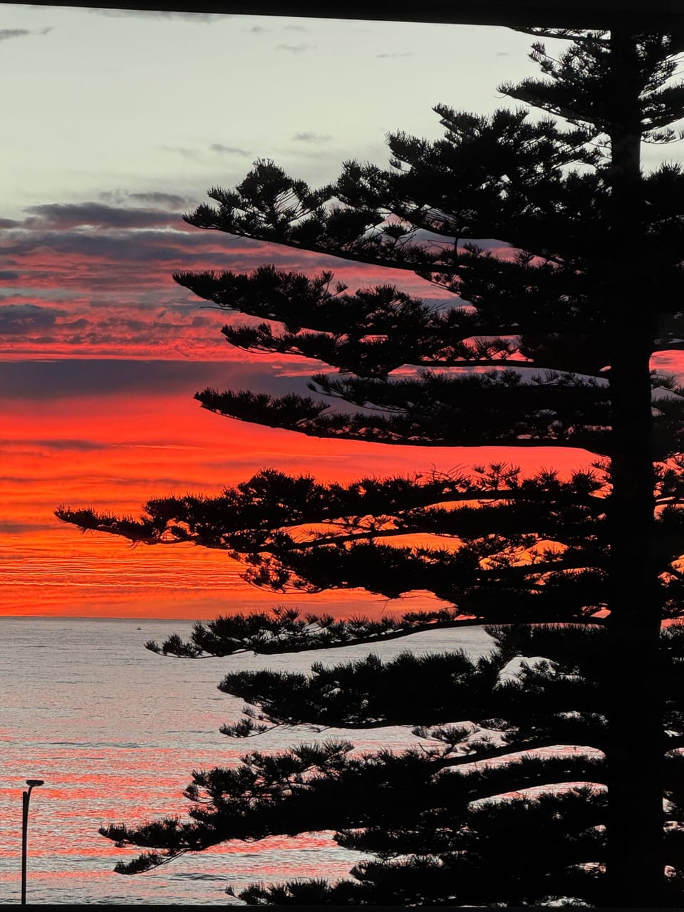 Enjoy beautiful sunrises and sunsets every day - photo taken main property. 