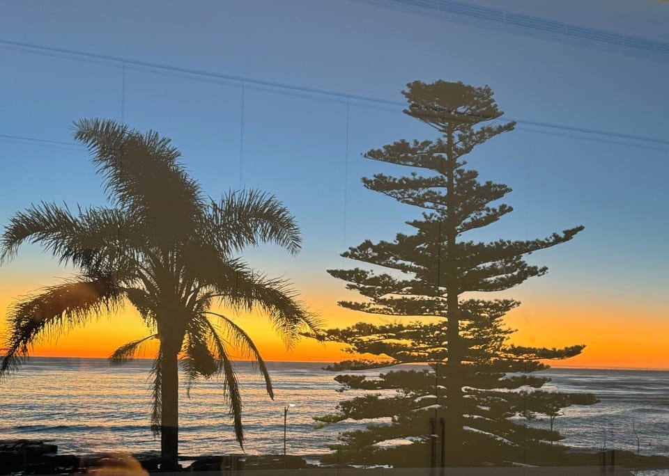 Enjoy beautiful sunrises and sunsets every day - photo taken main property. 