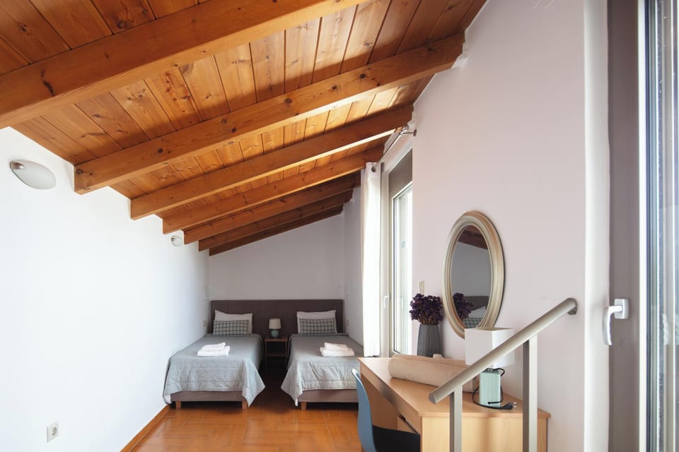 The second bedroom, located in the attic, features 2 twin size beds, which can be joined together upon request