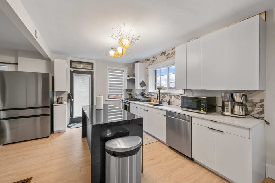 Cozy kitchen vibes with a modern twist! Loving the sleek lines and natural light.