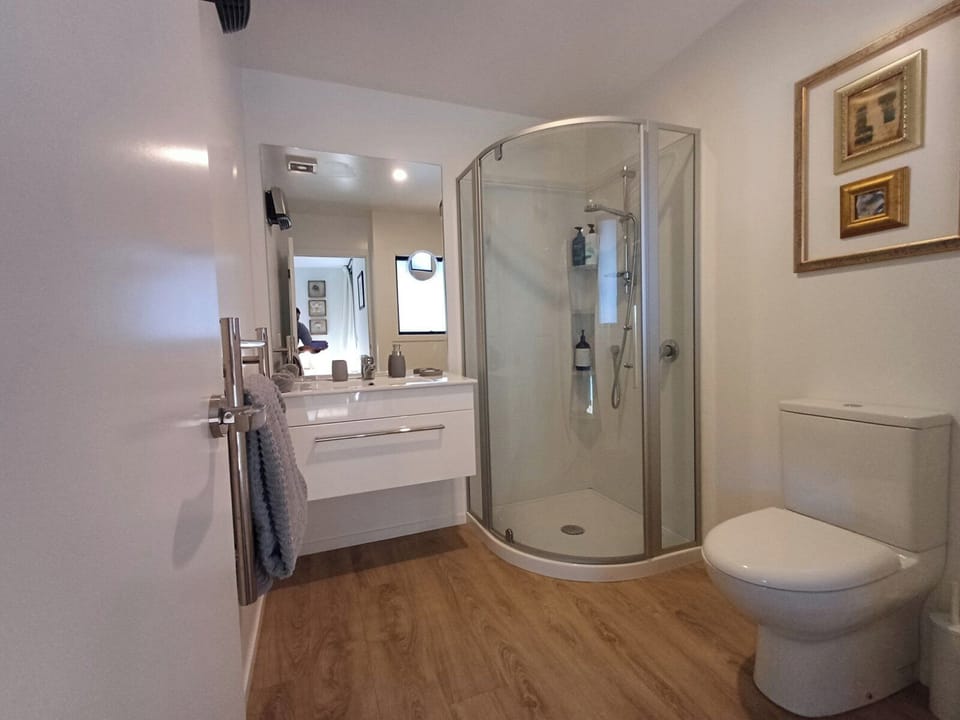 Bathroom with heated towel rail