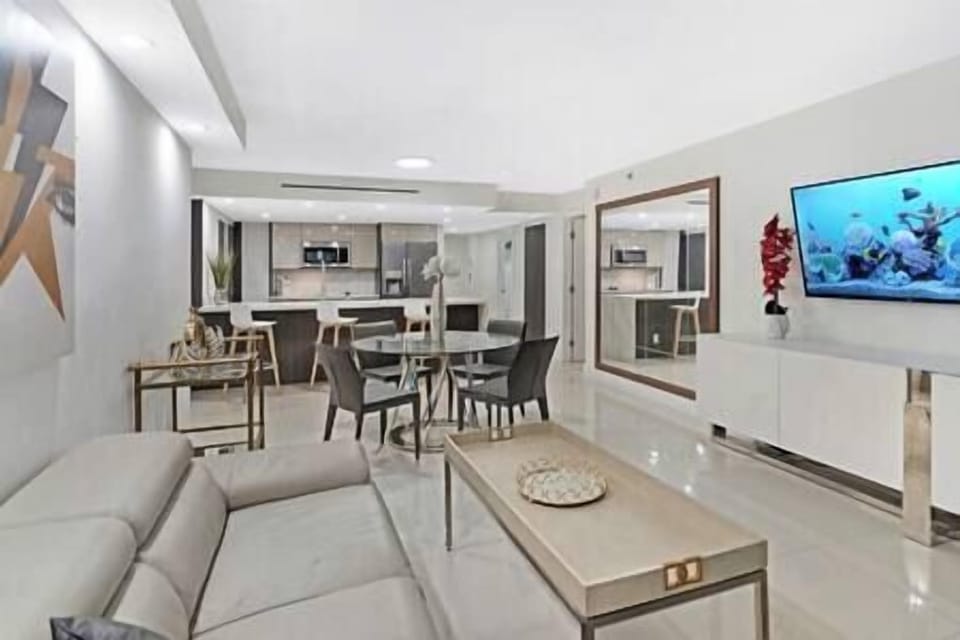 Dining area, living area with patio access and Roku streaming tv